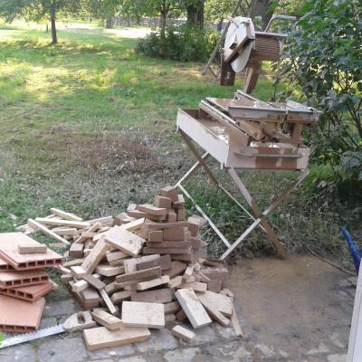 the water-cooled circular saw (and the waste pile at the end of the second day)