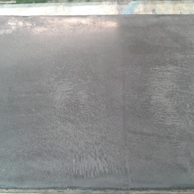 closeup of my neighbour’s black tile